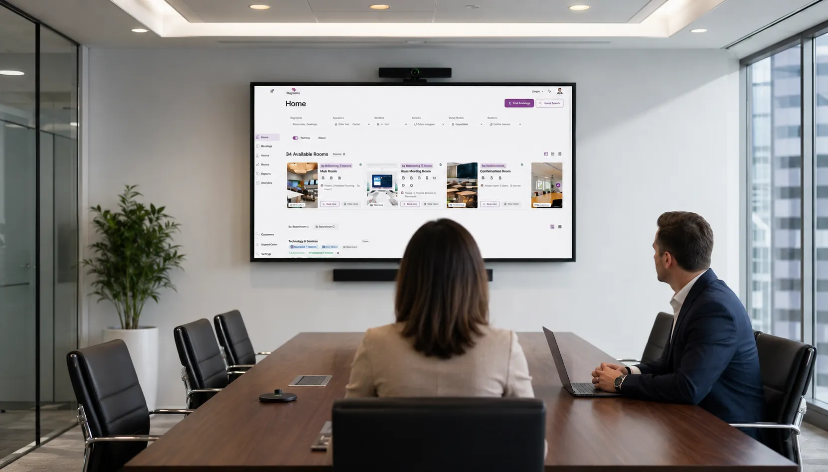 MeetWise management portal shown on a large screen during a boardroom meeting
