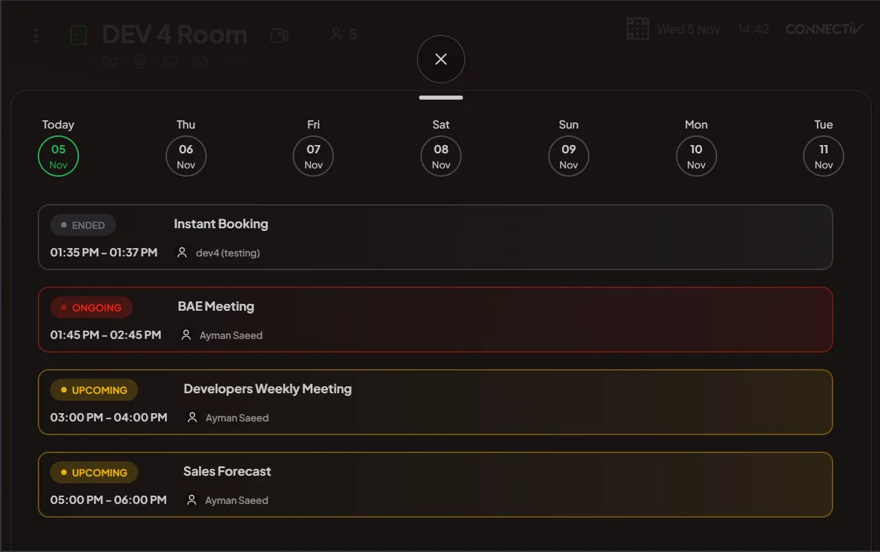 Room display showing the seven-day meeting agenda